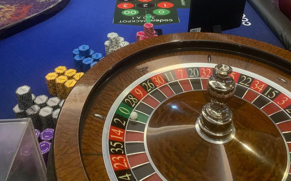 Live dealer at a roulette table