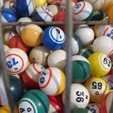 Numbered lottery balls in a drum