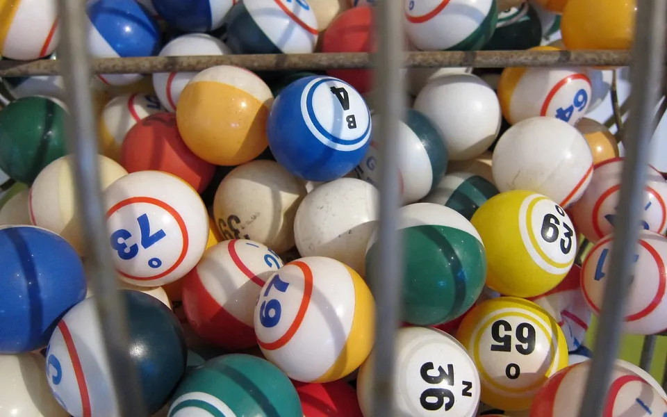 Numbered lottery balls in a drum
